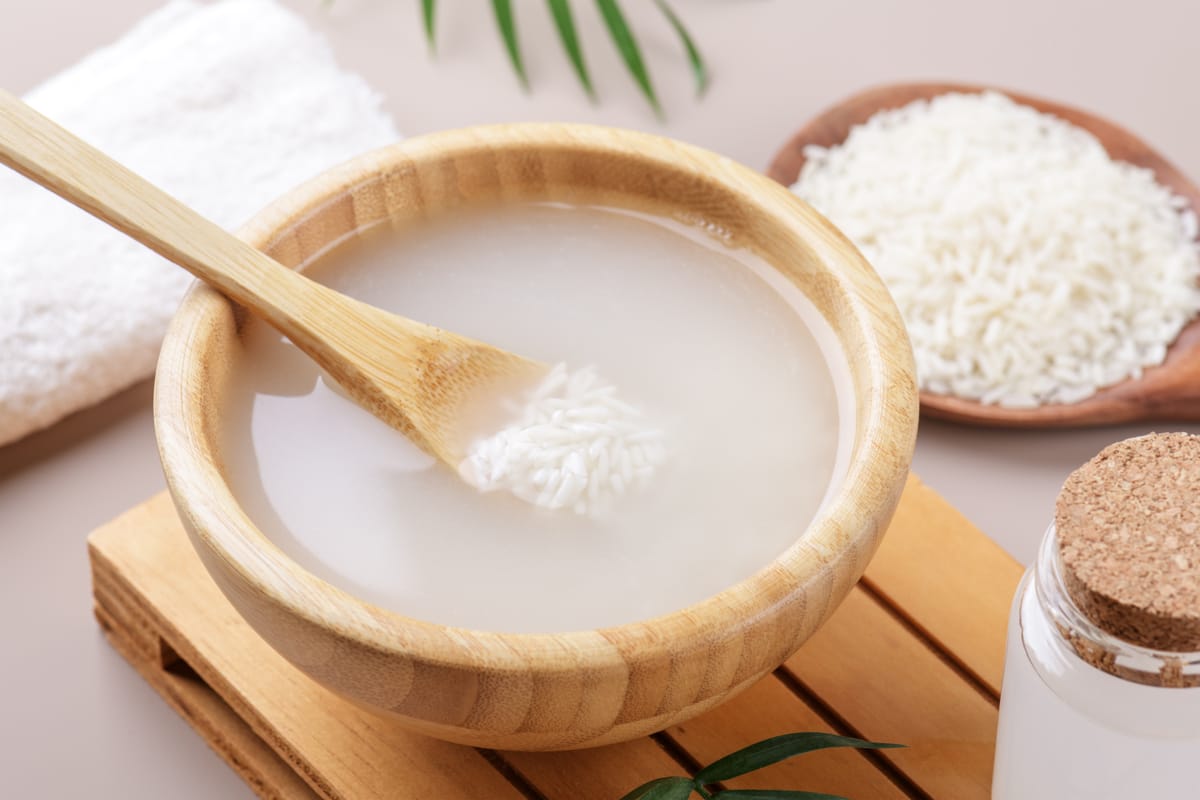 The $0.50 "Liquid Silk" Secret: How Fermented Rice Water Actually Rebuilds Hair Strength